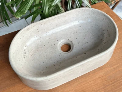 Lavabo oval de concreto con acabado granilite