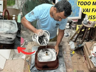 Hombre haciendo lavabo de concreto en ambiente artesanal